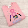 Make-up Geburtstagsshirt Mädchen personalisiert mit Glitzerzahl und bestickten Schmink-Motiven – LaLeBe Creations